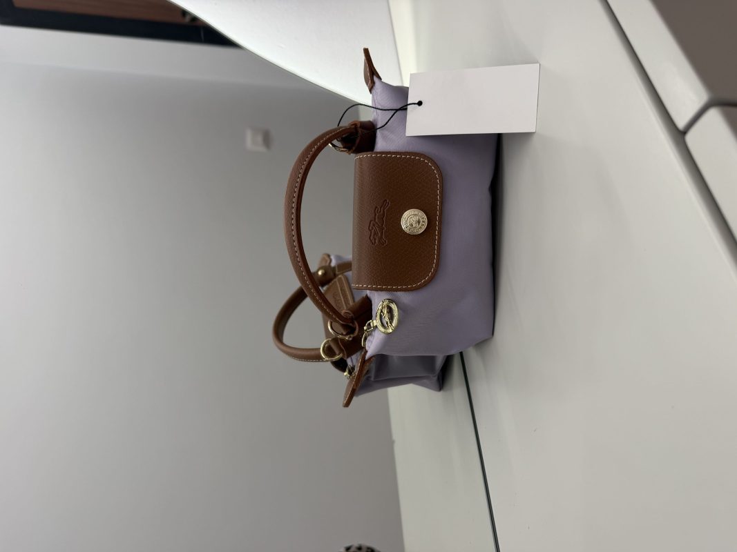 Çantë Longchamp Le Pliage Mini, elegant brown and lavender design.