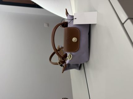 Çantë Longchamp Le Pliage Mini, elegant brown and lavender design.