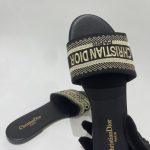 Christian Dior Slide E Zeze, elegant black sandals with logo strap.
