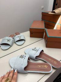 Shapka Loro Piana Slide Flats, elegant suede design on display.