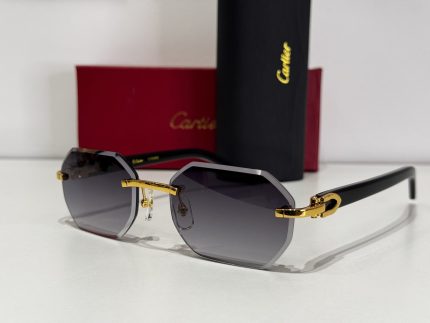 Elegant Cartier sunglasses with gold accents and protective lenses.