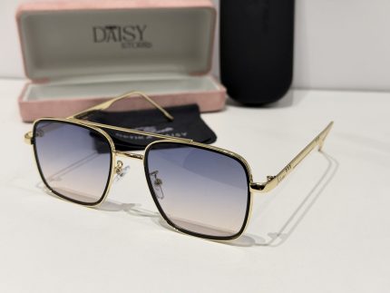 Elegant Cartier sunglasses with gold frame and gradient lenses.