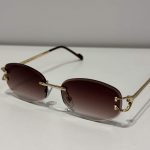 Syze Dielli cartier round gold me dizajn modern dhe mbrojtje nga rrezet UV.