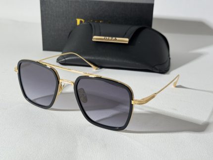 Men's Dita sunglasses with gold frame and black case.