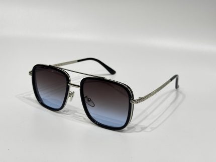Stylish gradient lens sunglasses with metal frame for eye protection.