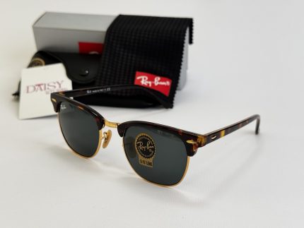 Ray-Ban sunglasses with case and packaging on display.