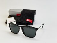Ray-Ban sunglasses with case and cleaning cloth displayed.