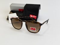 Ray-Ban sunglasses with case and cleaning cloth.