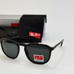 Ray-Ban sunglasses with case and cleaning cloth displayed.