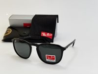Ray-Ban sunglasses with case and cleaning cloth displayed.