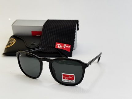 Ray-Ban sunglasses with case and cleaning cloth displayed.
