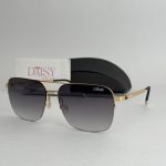 Men's Silhouette sunglasses with gold frame and gradient lenses.