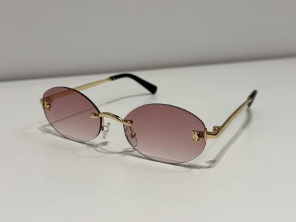 Cartier rimless sunglasses with pink lenses and gold accents.