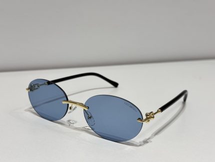 Tiffany & Co rimless sunglasses with blue lenses and gold accents.