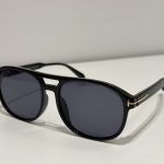 Tom Ford Aviator Sunglasses, black frame, elegant design.