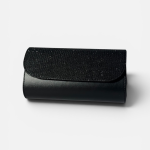 Elegant black women's clutch with glittery texture.