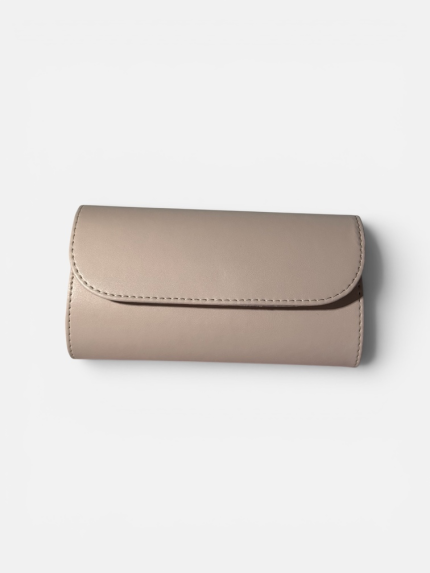 Elegant beige women's clutch purse on white background.