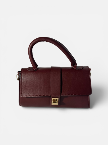 Elegant burgundy handbag for women with gold clasp.