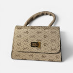 Elegant beige handbag with patterned design and gold clasp.