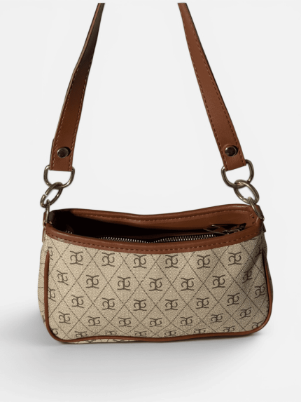 Elegant beige women's bag with brown leather strap.