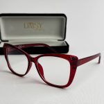 Red eyeglasses with case, stylish blue light protection.