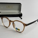 Syze Qetesuese Blue Control glasses with stylish protective design.