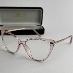 Stylish pink eyeglasses with case, Syze Qetesuese Blue Control.