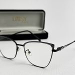 Syze Qetesuese Blue Control glasses with stylish black frame and case.