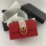 Pinko Love Bag red handbag in open box with tissue paper.