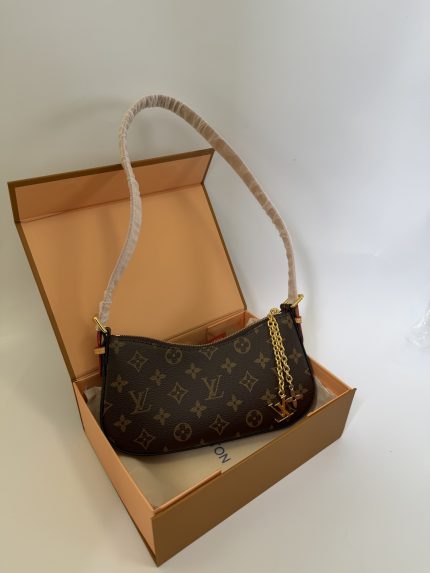 Louis Vuitton Multi Pochette handbag in box, monogram design.