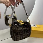 Fendi Baguette Mini handbag with gold accents and logo pattern.