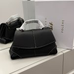 Polene Flap Bag Çanta Femrash in black with white stitching on display.