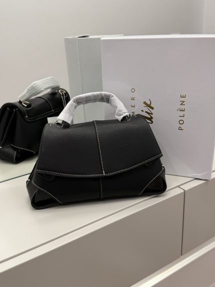 Polene Flap Bag Çanta Femrash in black with white stitching on display.