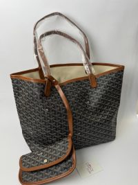 YSL Le5A7 Hobo bag with brown leather trim and pouch.