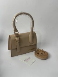Beige YSL Le5A7 Hobo bag with detachable strap and gold accents.