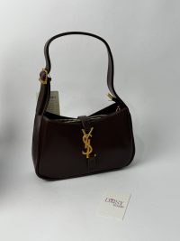 YSL Le5A7 Hobo brown leather handbag with gold logo.