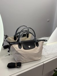 Canta Longchamp Le Pliage Cuir handbag with black leather accents.