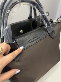 Canta Longchamp Le Pliage Cuir handbag with protective handles.
