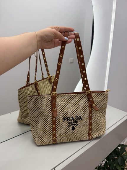 Prada Knit Tote with brown straps, elegant woven design.