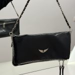 Black Zadig & Voltaire women's bag with chain strap and logo.