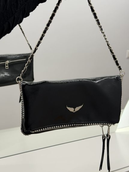 Black Zadig & Voltaire women's bag with chain strap and logo.
