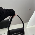 Black Diesel women's handbag with logo, stylish and modern design.