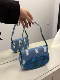 Diesel 1DR women's handbag, denim style, functional design.