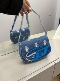 Denim Diesel 1DR women's handbag with blue logo accent.