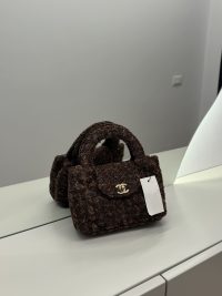 Chanel Tweed Mini Bag, elegant brown handbag for any occasion.
