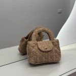 Chanel Tweed Mini Bag on mirror, elegant for any occasion.