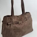 Brown suede handbag with strap, elegant and stylish design.