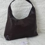 Woven hobo bag for women, elegant and comfortable design.