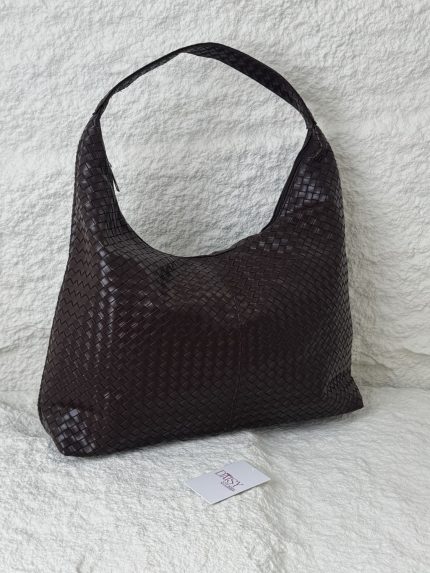 Woven hobo bag for women, elegant and comfortable design.