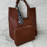 Brown tote bag with scarf, elegant style.